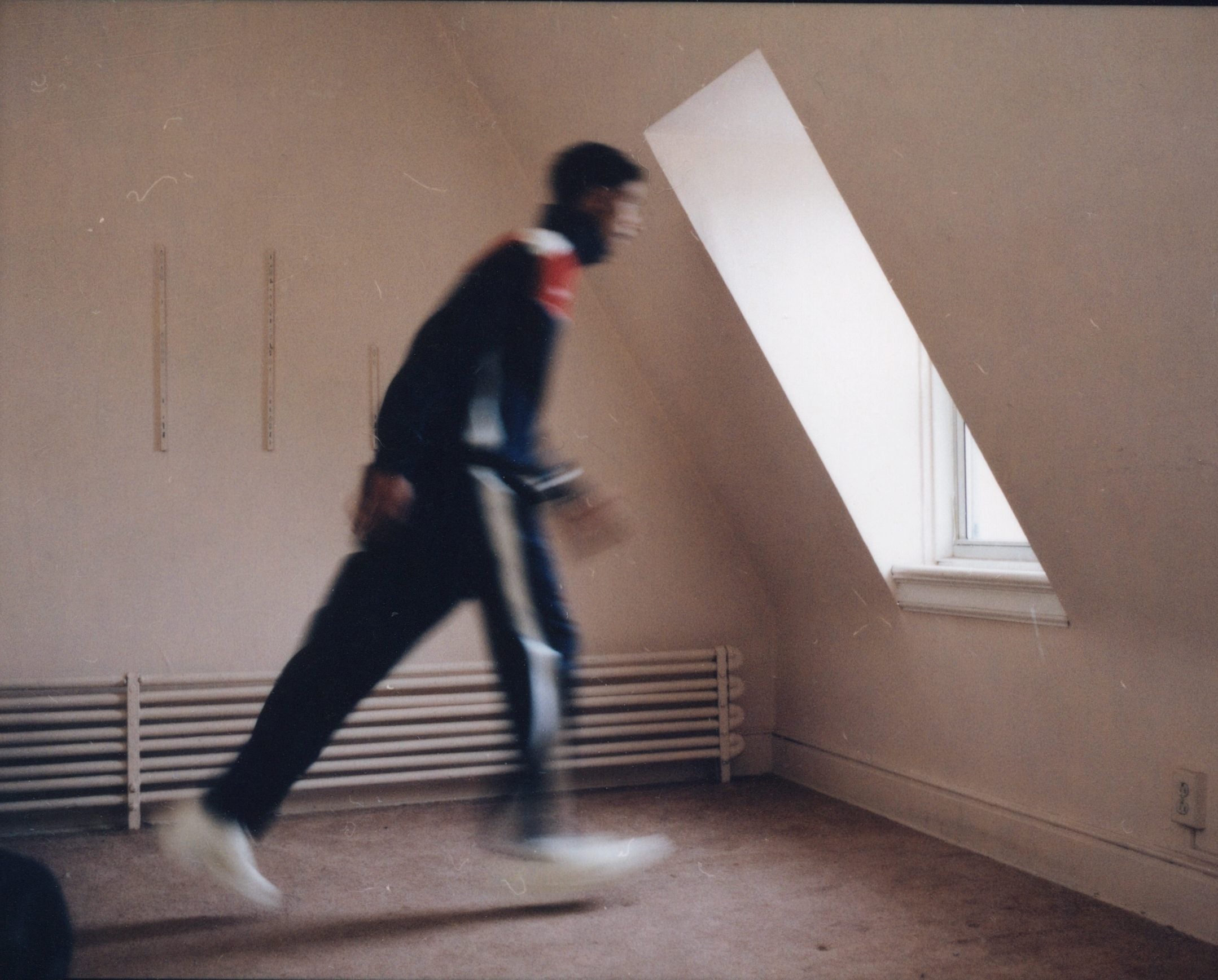 Model walking in an Olivier Rogers tracksuit